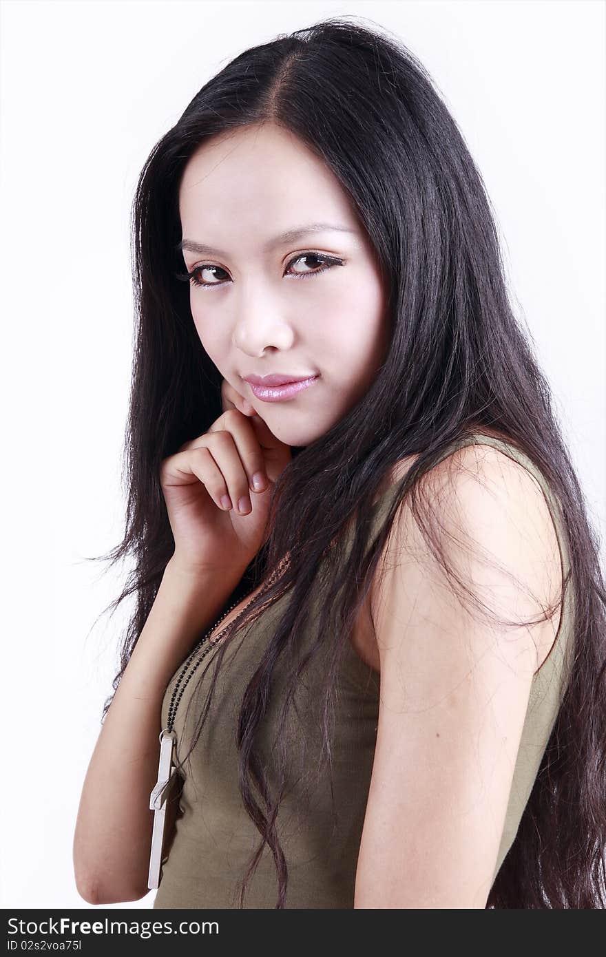 Pretty Asian woman with long hair on white.