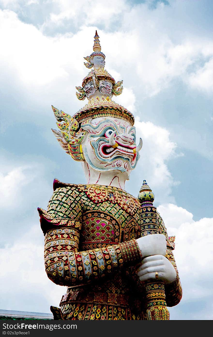 Thai Giant in front of the temple door.
 of thailand at wat prakeaw. Thai Giant in front of the temple door.
 of thailand at wat prakeaw.