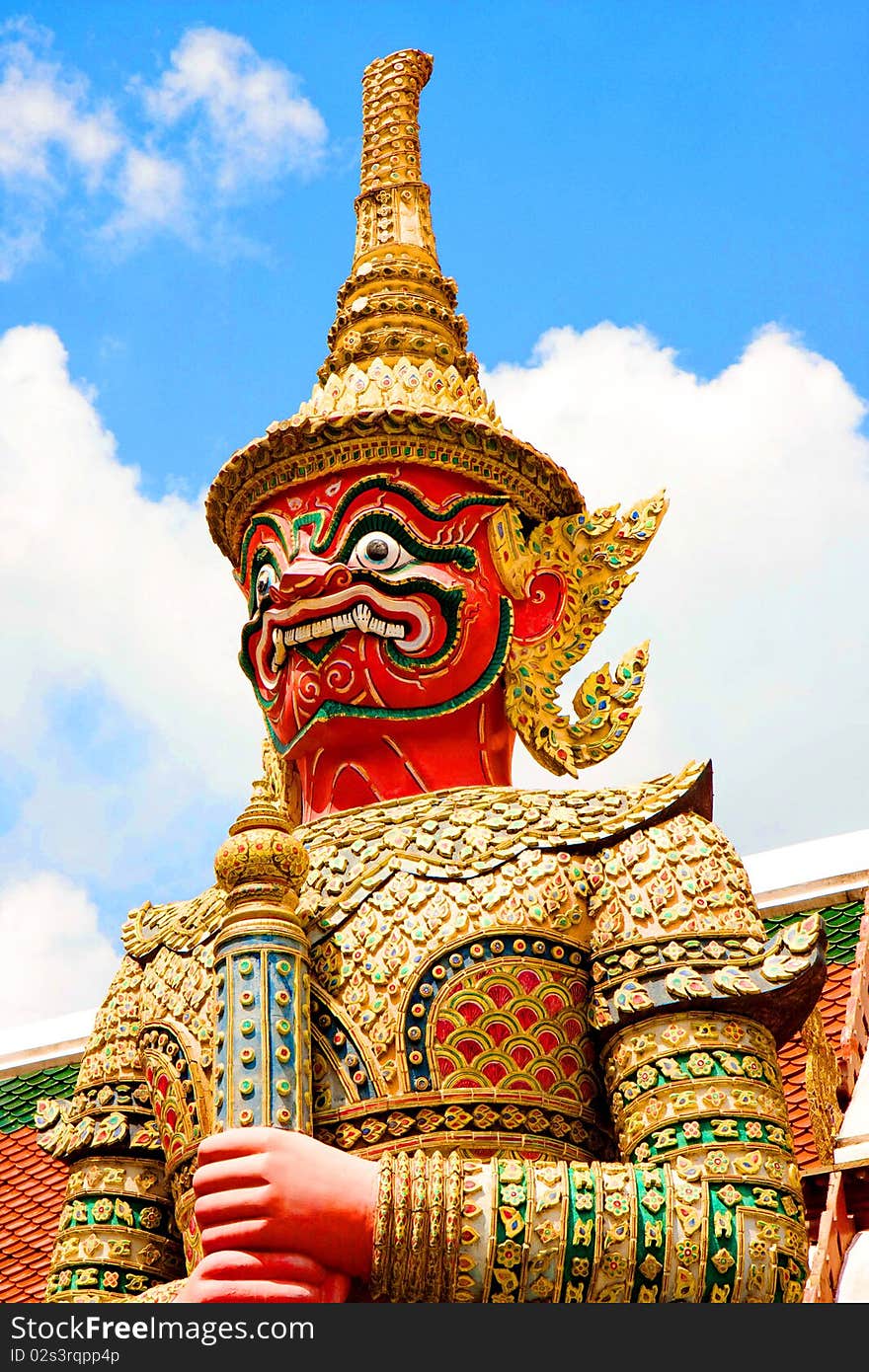 Thai Giant in front of the temple door.
 of thailand at wat prakeaw. Thai Giant in front of the temple door.
 of thailand at wat prakeaw.