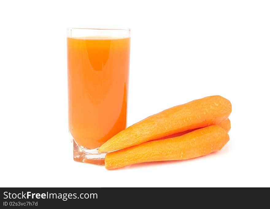 Glass of juice with carrot on a white background