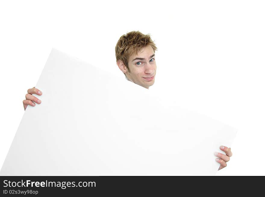 Young businessman holding a white cardboard sign with copyspace above and below. Young businessman holding a white cardboard sign with copyspace above and below