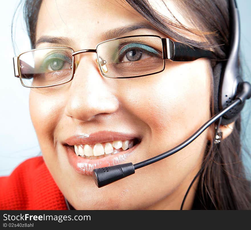 Call center operator on white background, asian woman.