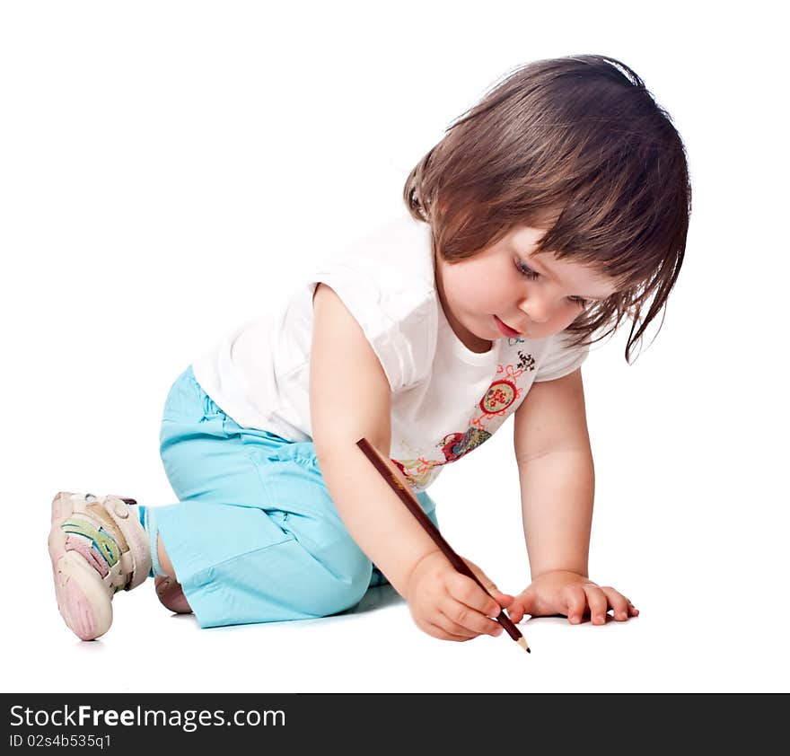 Little girl draws. Isolated on white