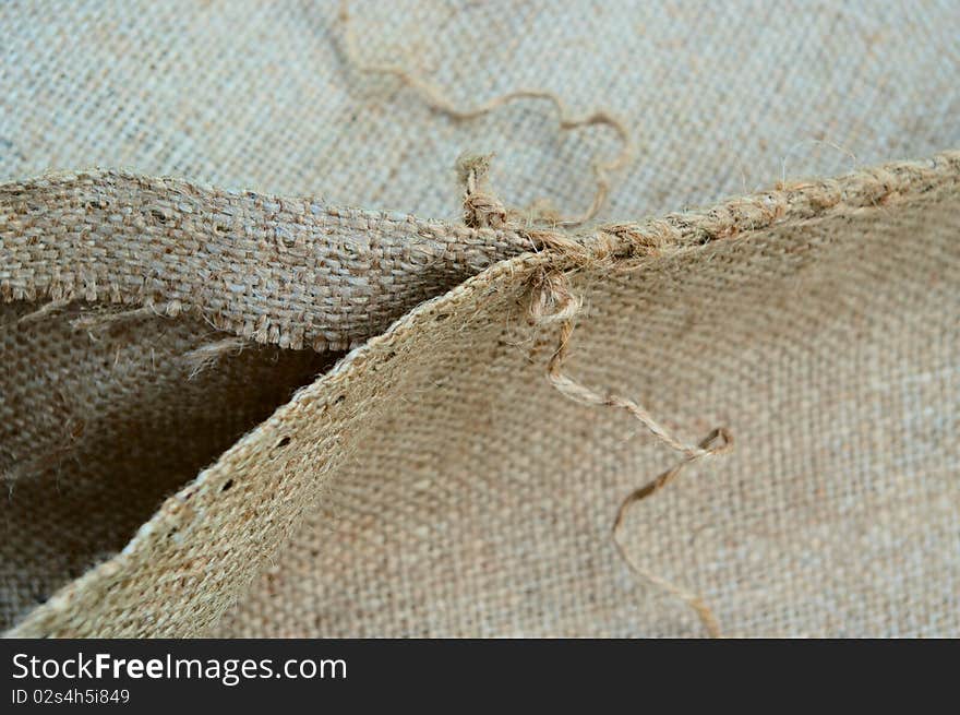 Open jute bag with thread. Open jute bag with thread.