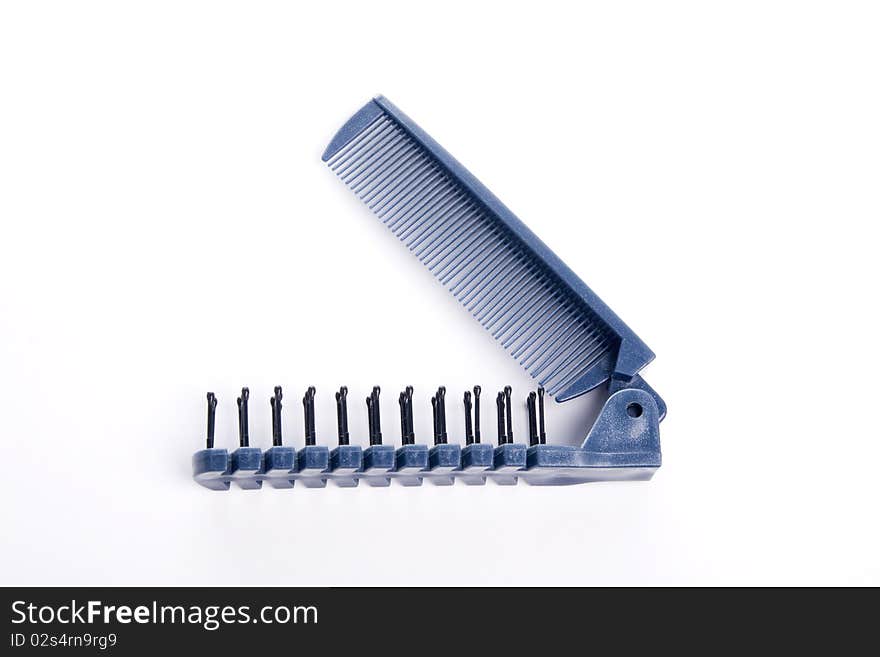 Blue comb on white background,multifunctional,folding,isolated