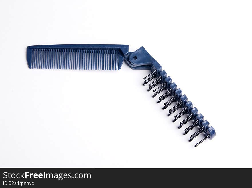 Blue comb on white background,multifunctional,folding,isolated