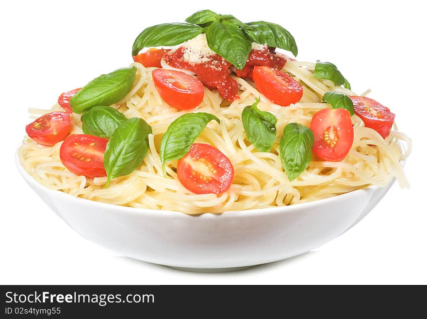 Pasta with tomato and basil on white background