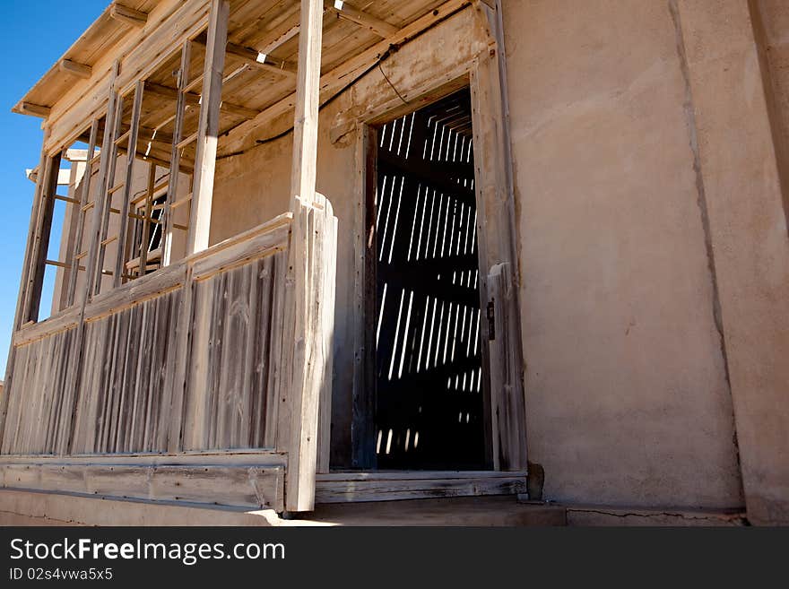 Old ruin in the abandoned diamond town Kolmanskop in Namibia