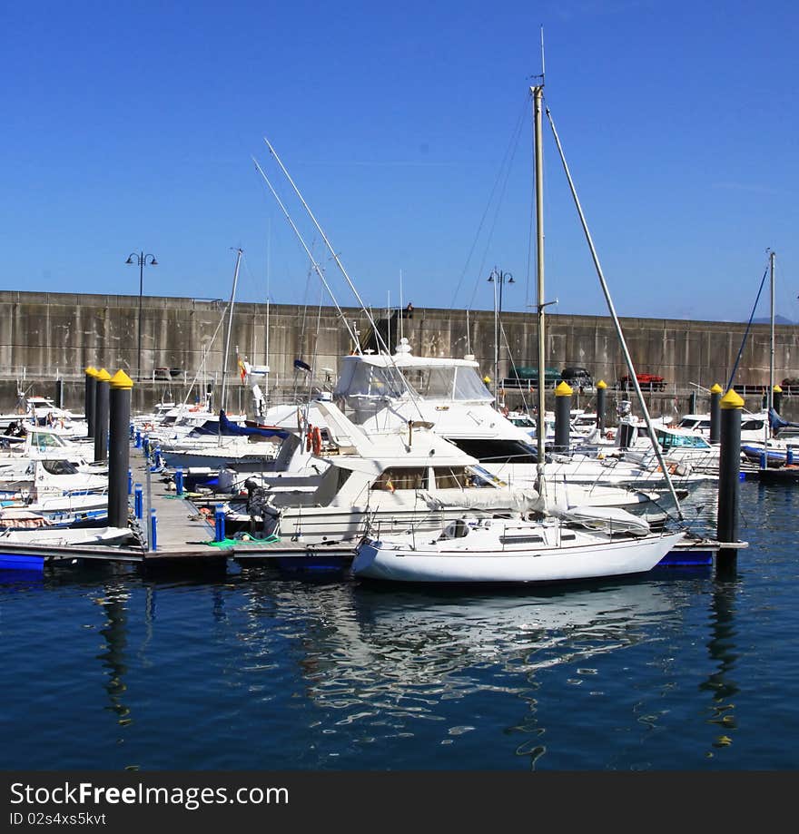 Sportifs and fishing yatches into the port when the tide goes out. Sportifs and fishing yatches into the port when the tide goes out