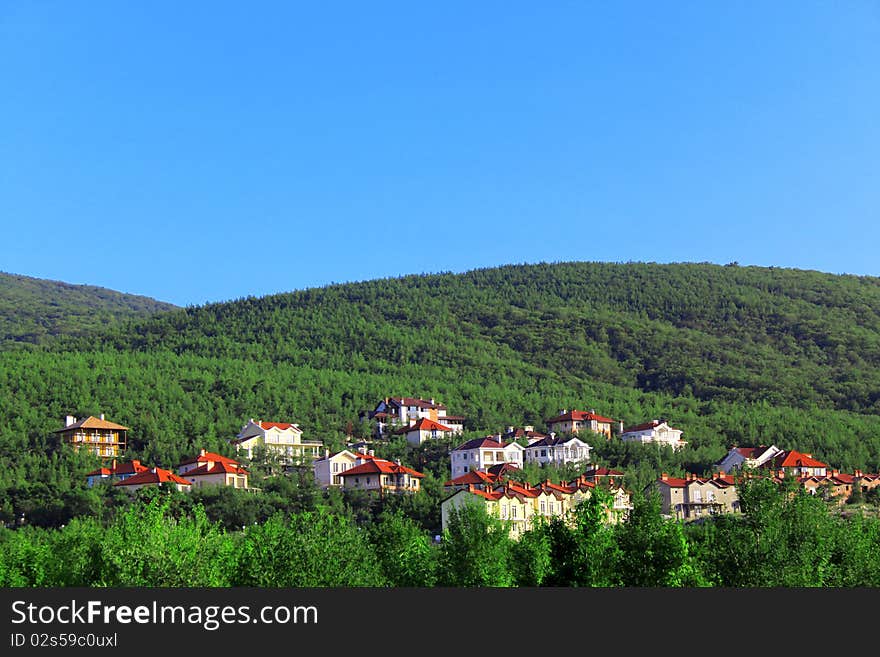 Beautiful houses on a mountain slope. Beautiful houses on a mountain slope