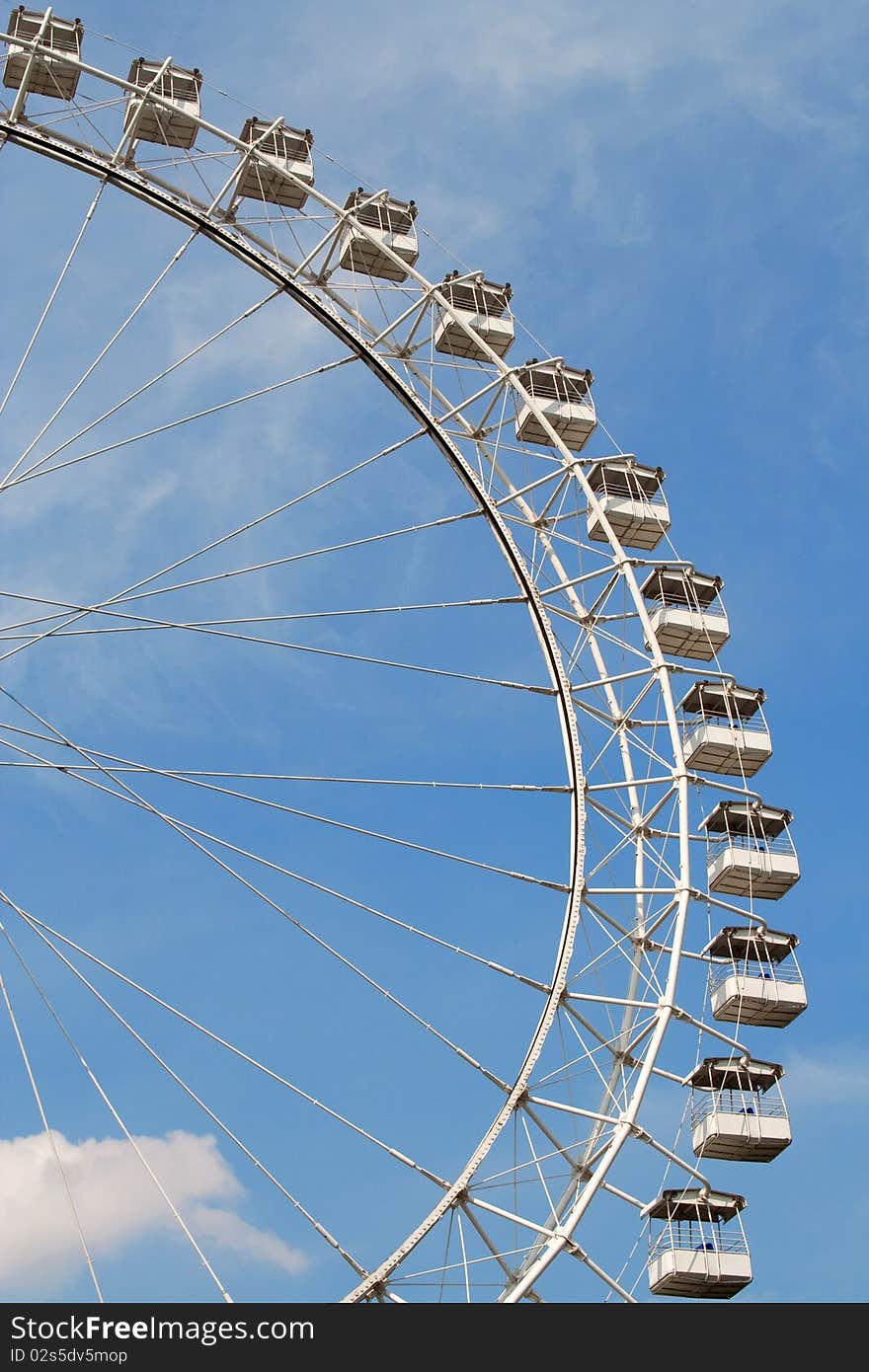 Classic ride big Ferris wheel at an amusement park