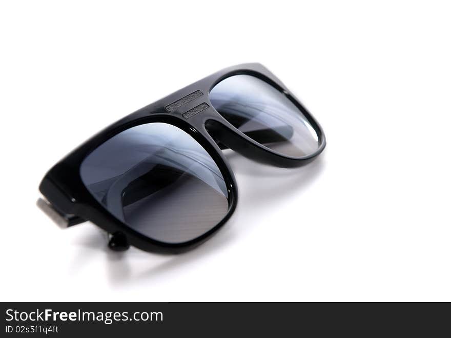 Black sunglass on white background