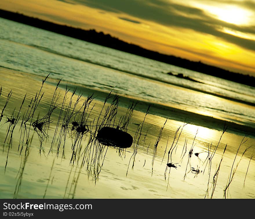 Beautiful sunset on a remote and wild beach. Beautiful sunset on a remote and wild beach