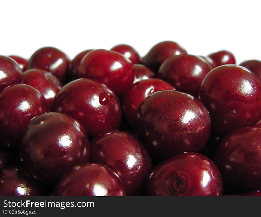 fresh ripe cherries isolated on white