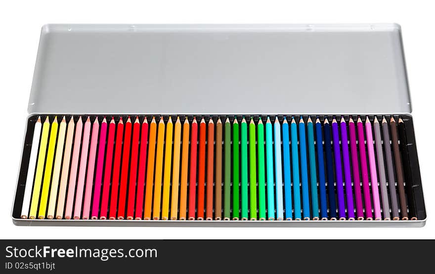 Color crayons in metal box isolated on white background. Color crayons in metal box isolated on white background