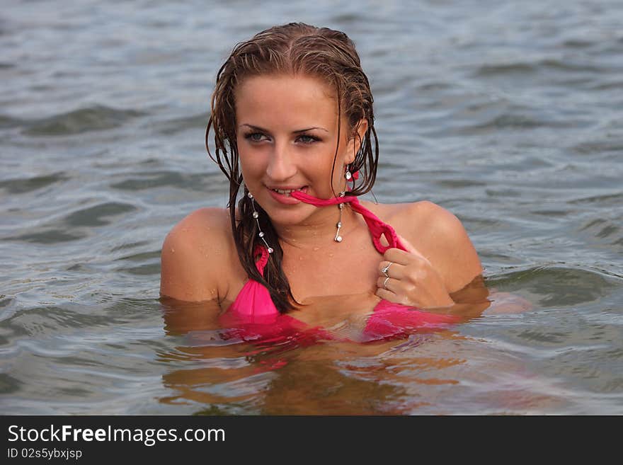 Attractive woman in the swimsuit