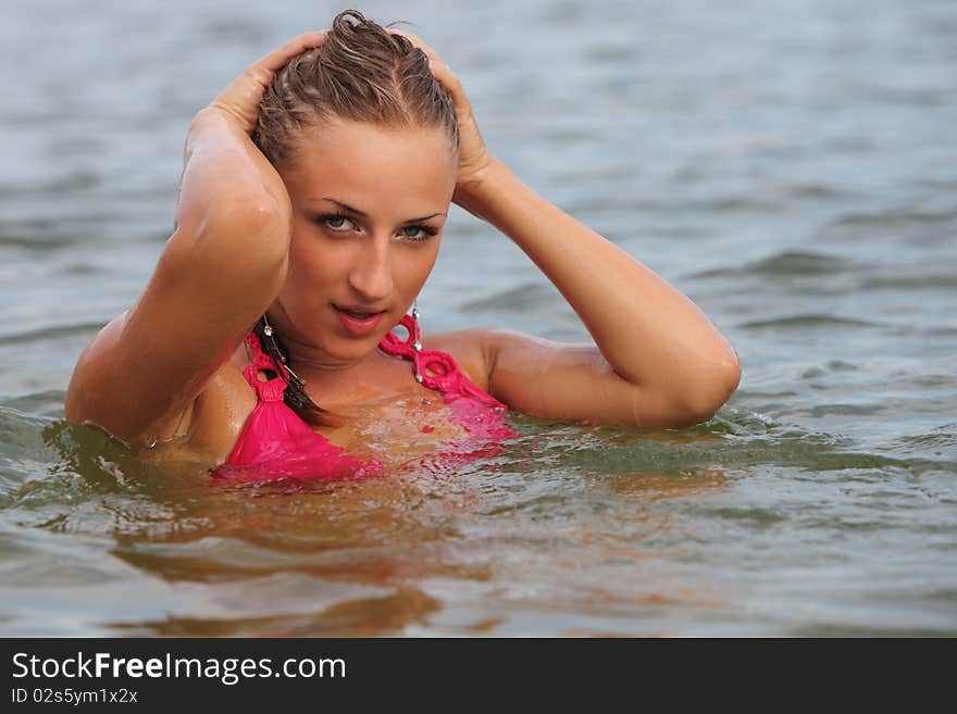 Attractive woman in the swimsuit