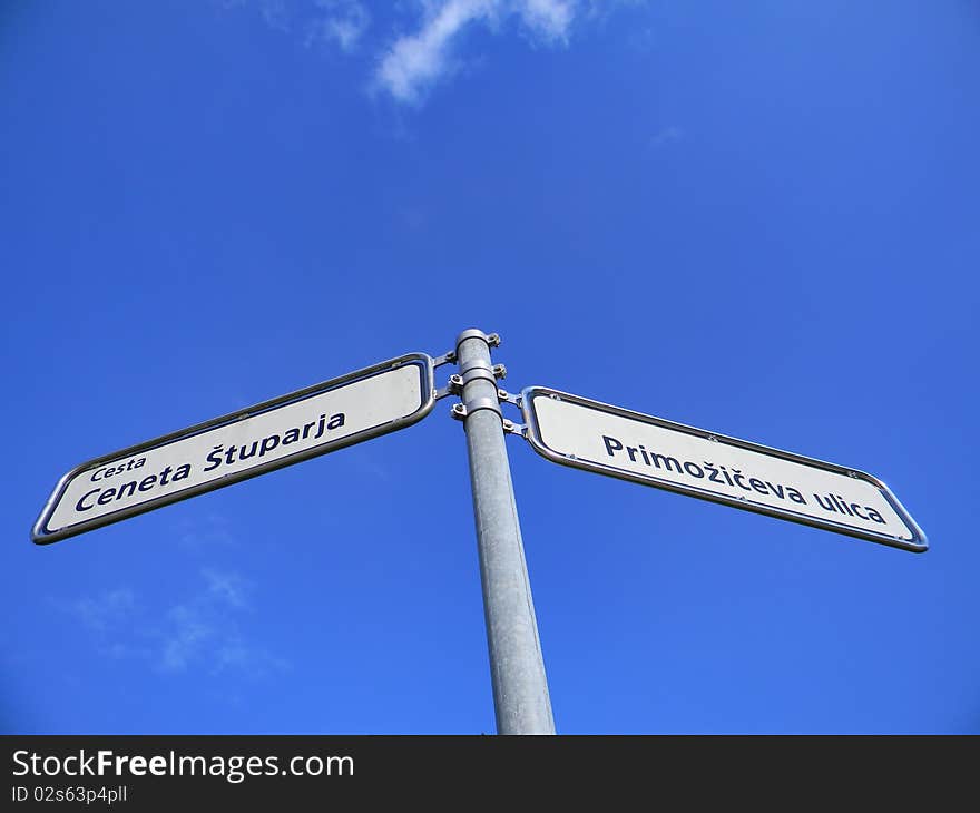 Signpost showing two possible destinations near my home. Signpost showing two possible destinations near my home