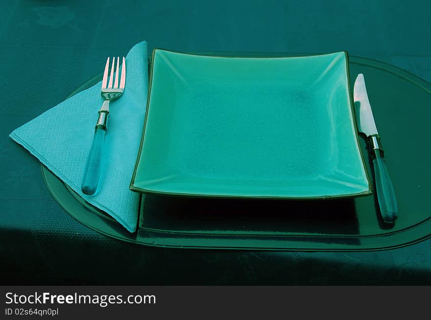 Empty dish, fork and knife.