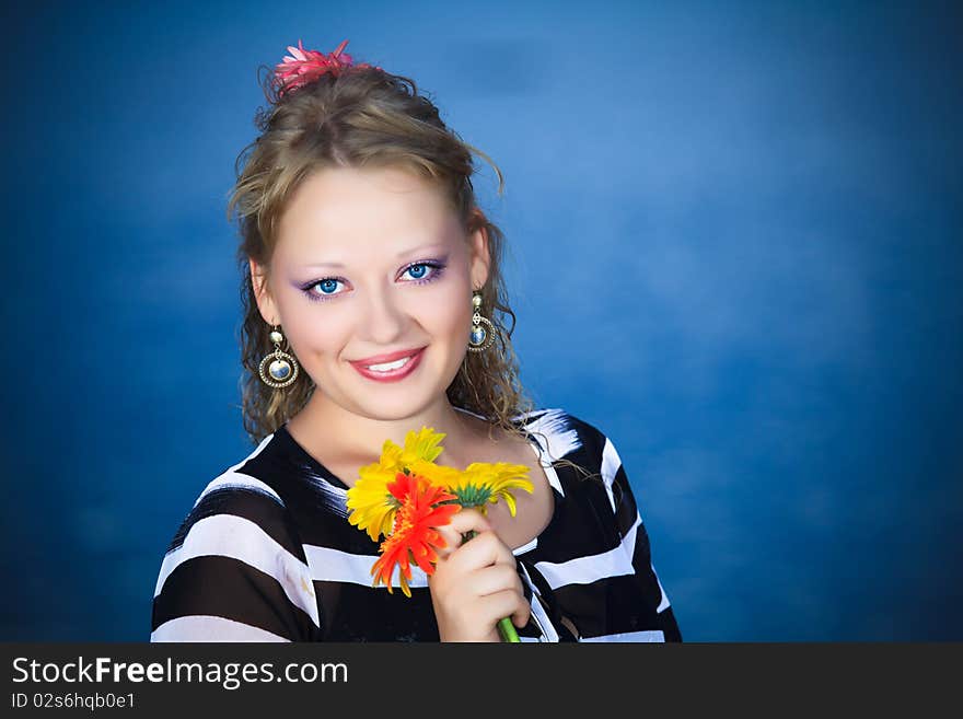 Beautiful woman with flowers in the sea. Beautiful woman with flowers in the sea