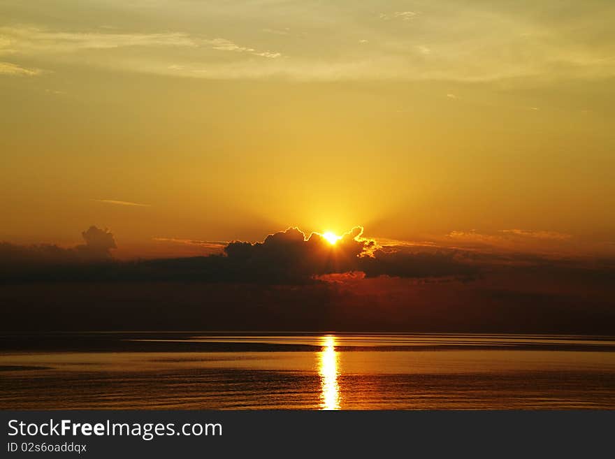 Sunset at Sea, red sun