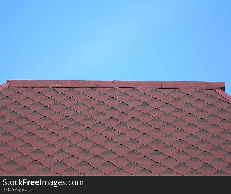 Detail of the roof with soft tiles.