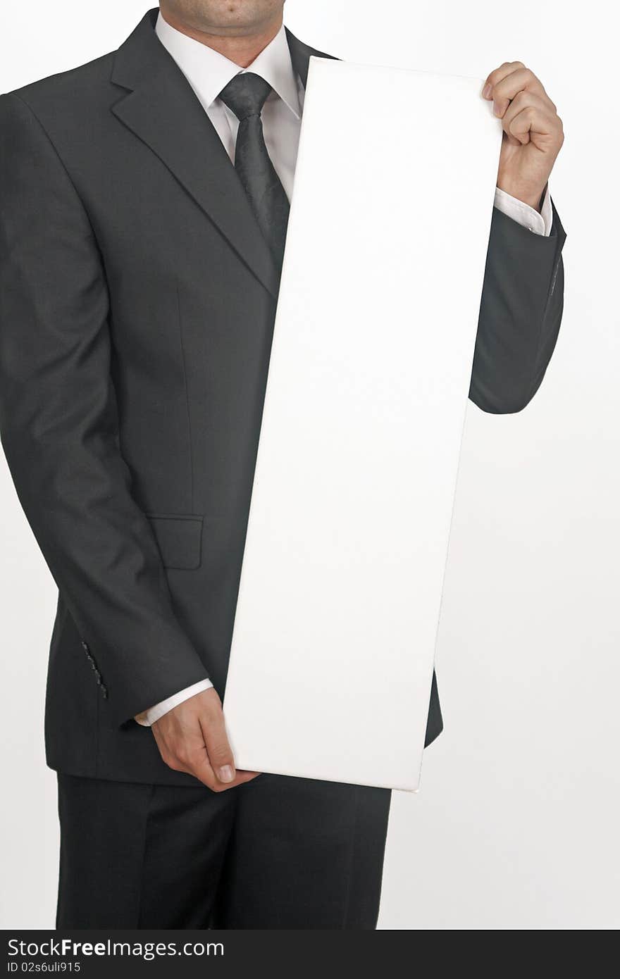 Business man with white card over a white background