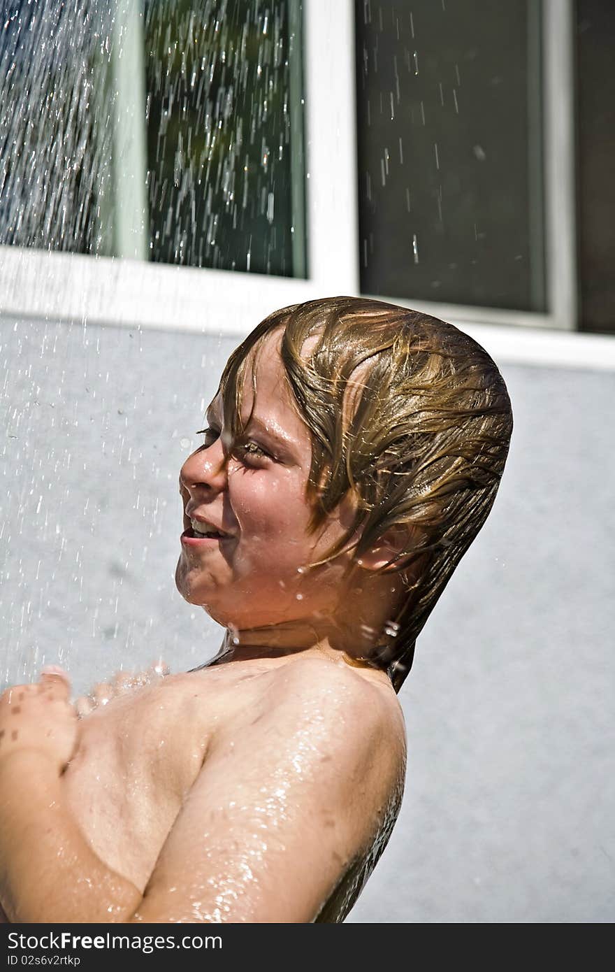 Child Has A Refreshing Shower