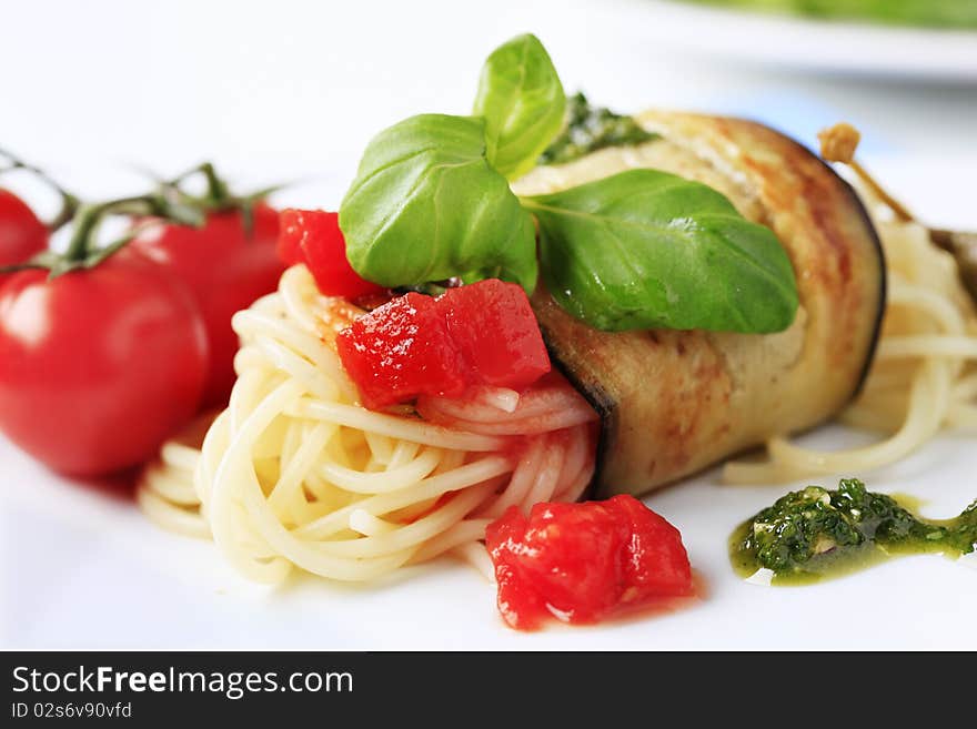 Spaghetti in a slice of fried eggplant. Spaghetti in a slice of fried eggplant