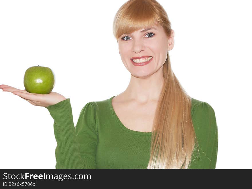 Green apple in a hand on white background. Green apple in a hand on white background