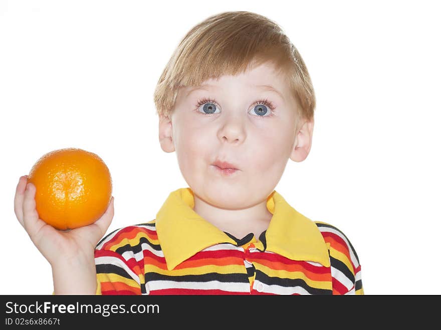 The child with an orange in a hand