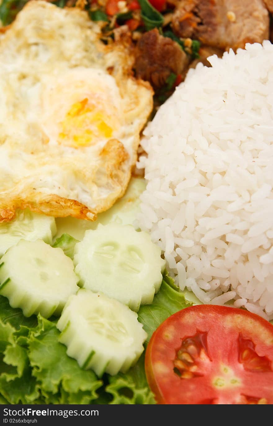 Crunchy pork fried with basil leaf and egg. Crunchy pork fried with basil leaf and egg