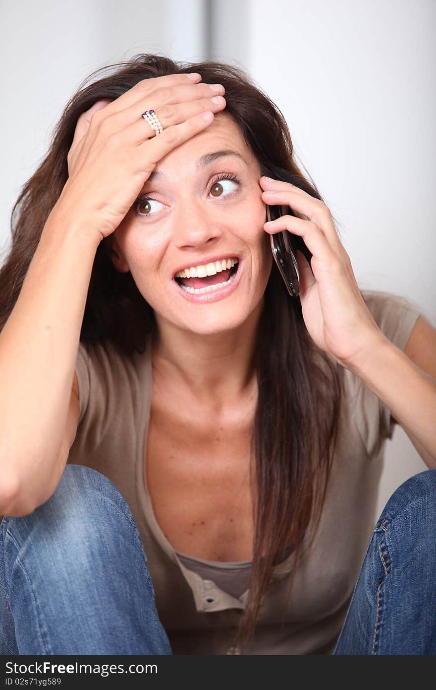 Closeup of woman in telephone conversation