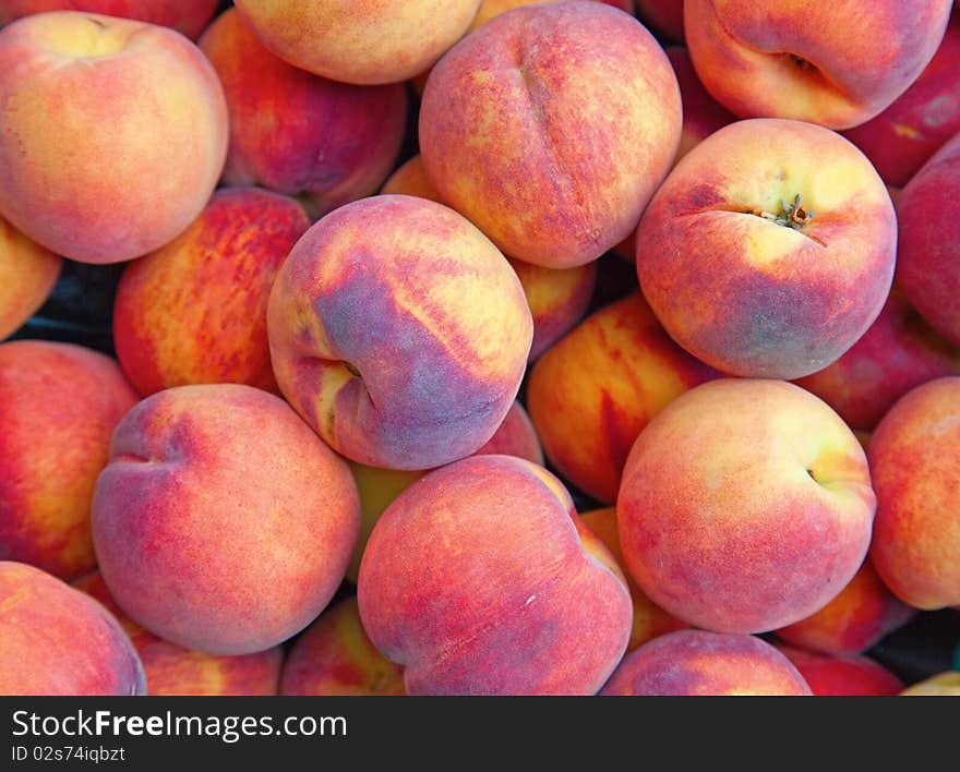 Background made of fresh ripe peaches. Background made of fresh ripe peaches