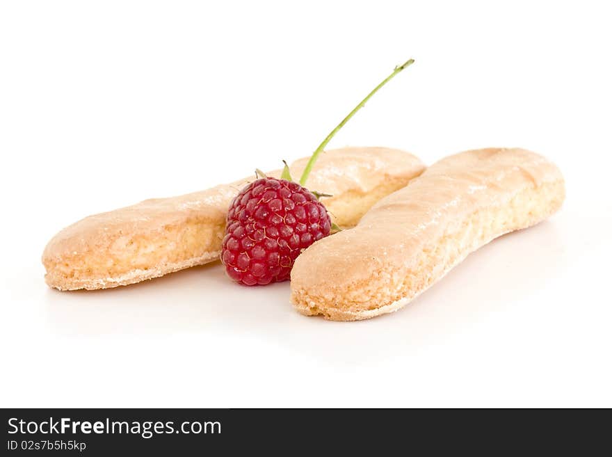 Biscuits and raspberries isolated on white. Biscuits and raspberries isolated on white