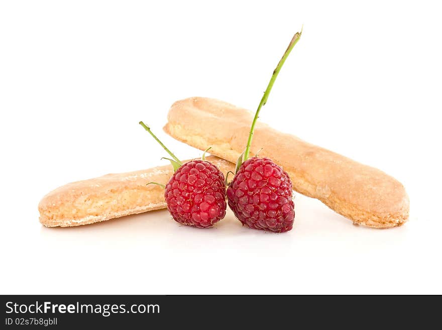 Biscuits and raspberries isolated on white. Biscuits and raspberries isolated on white