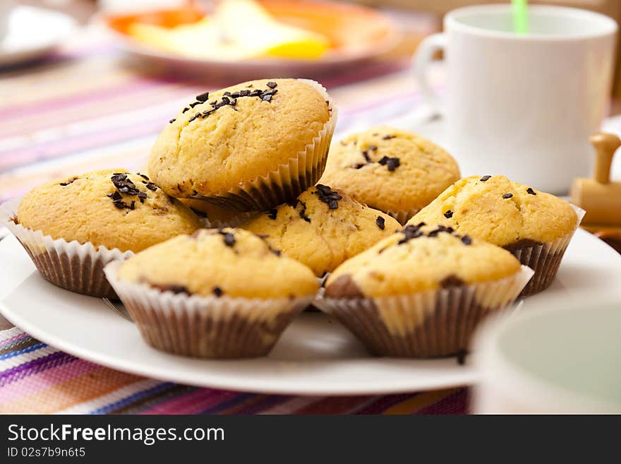 Chocolate chip muffins on a plate