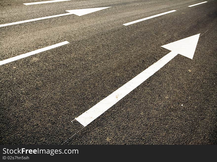 Road marking at sunset