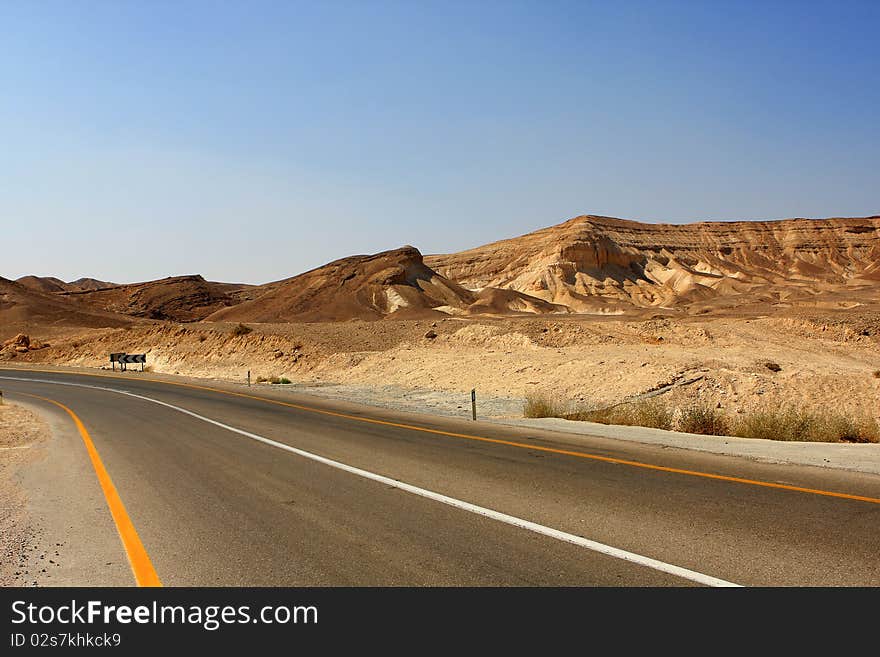 Empty road in the Negev desert, Israel. Empty road in the Negev desert, Israel