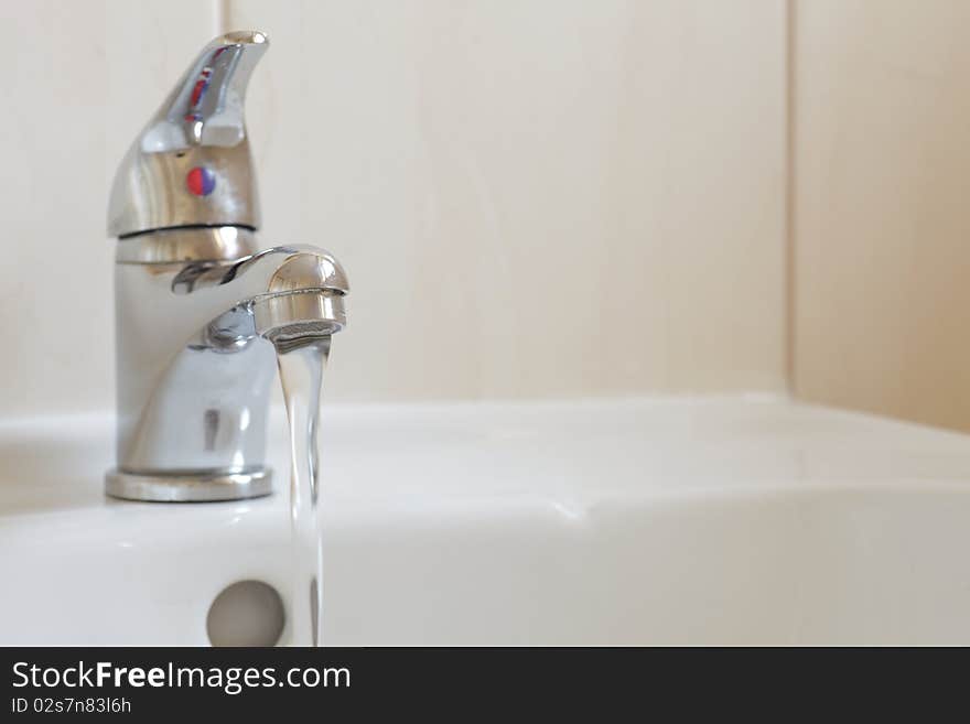 Bathroom interior with white sink and faucet - mixer tap. Bathroom interior with white sink and faucet - mixer tap