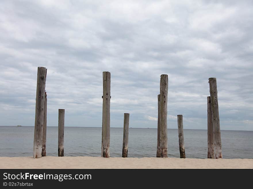 Rows Of Piles On The Sea Beach