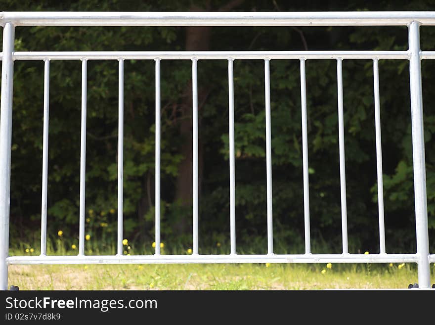 White steel fence railing