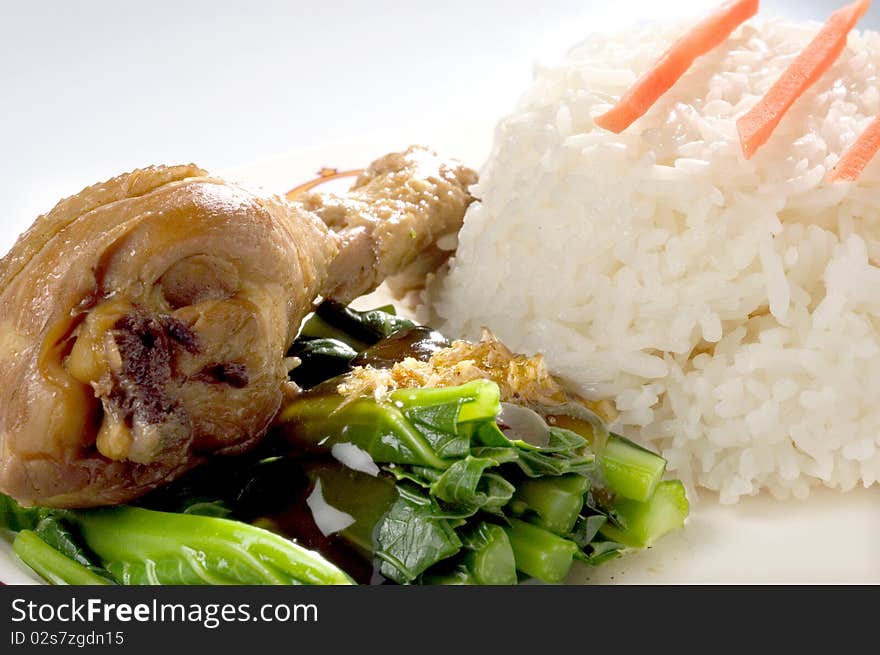 Steamed Garlic chicken and rice on white plate