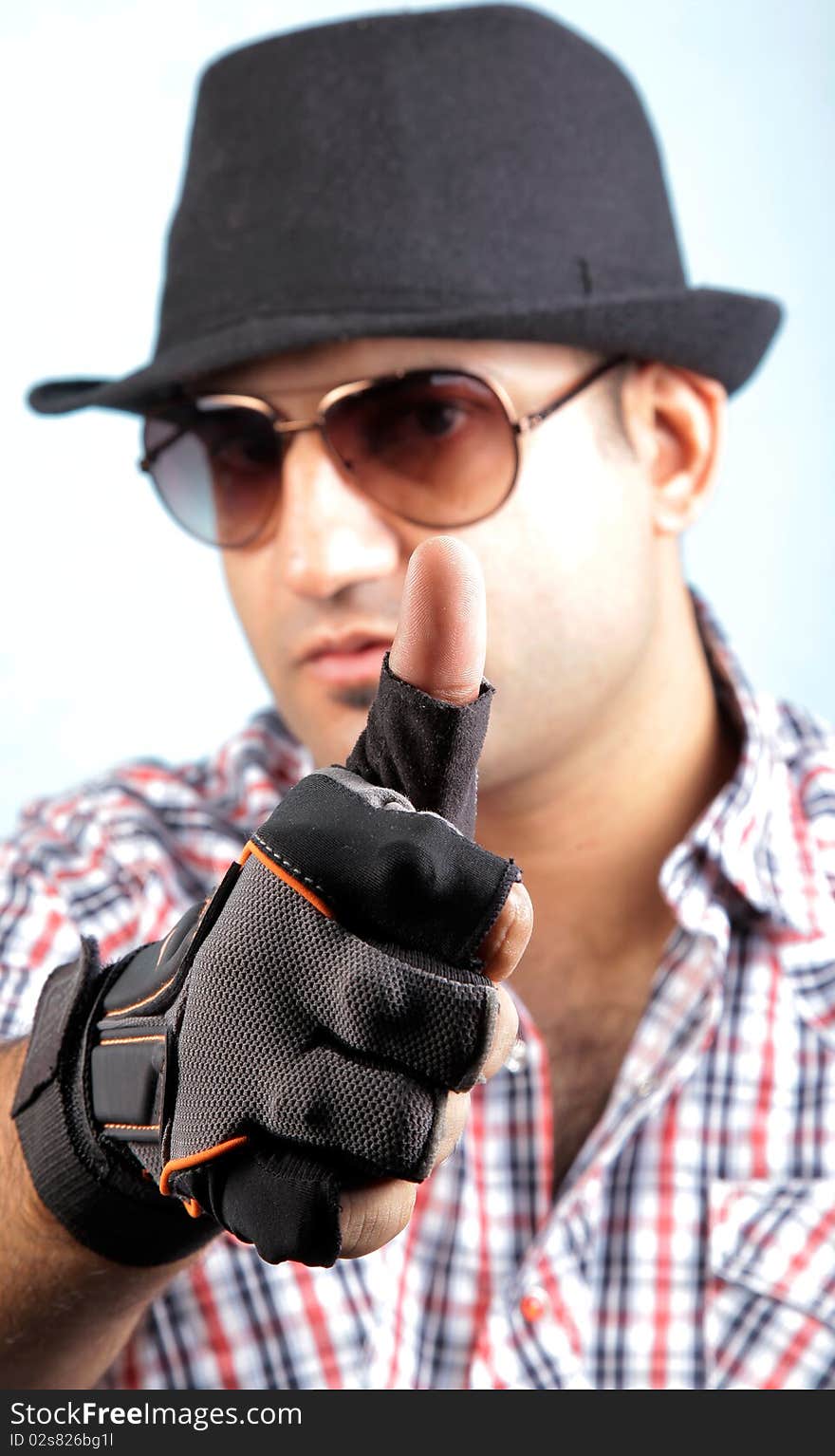 Male model boy showing thumbs up sign.