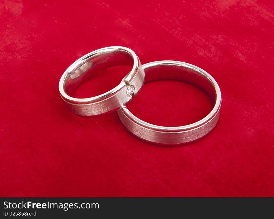 Engagement rings with red background