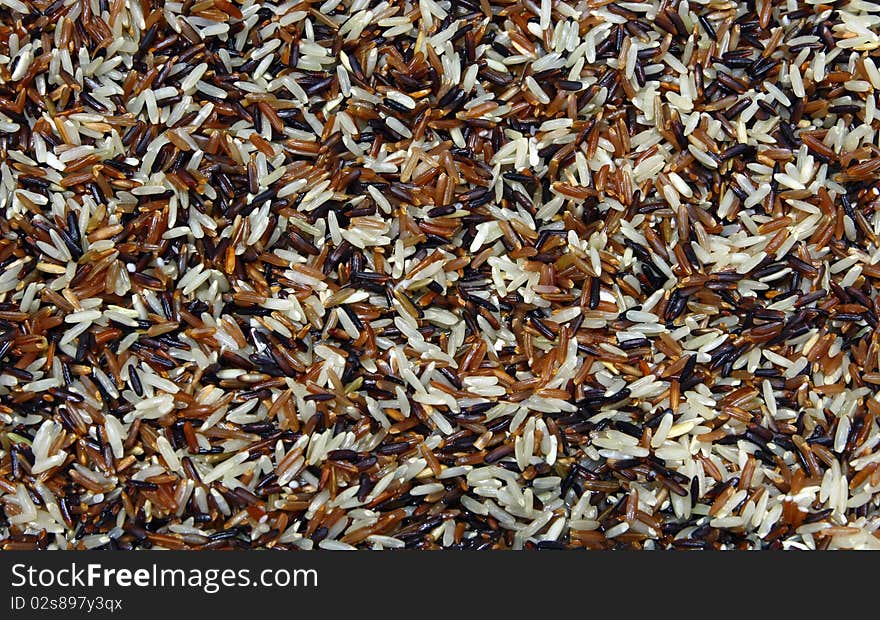 Wet Thai Whit-Red Jasmine and Fragment magenta rice, Trois Amis Organic, Background texture surface pattern. Wet Thai Whit-Red Jasmine and Fragment magenta rice, Trois Amis Organic, Background texture surface pattern.