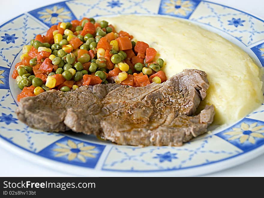 Meat With Potato And Mexican Salad