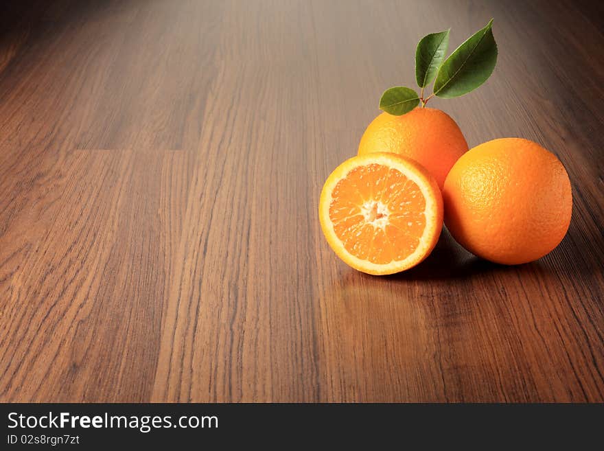 Fresh oranges on a table. Fresh oranges on a table.