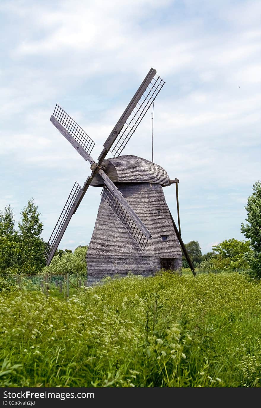 Old wooden windmill near Great Novgorod. Great Novgorod, Russia. Old wooden windmill near Great Novgorod. Great Novgorod, Russia