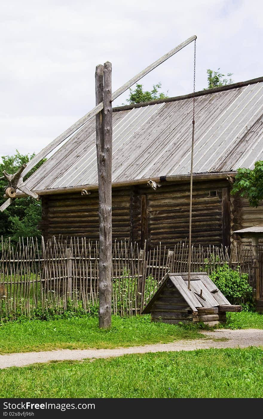 Wooden old draw-well near Great Novgorod. Great Novgorod, Russia